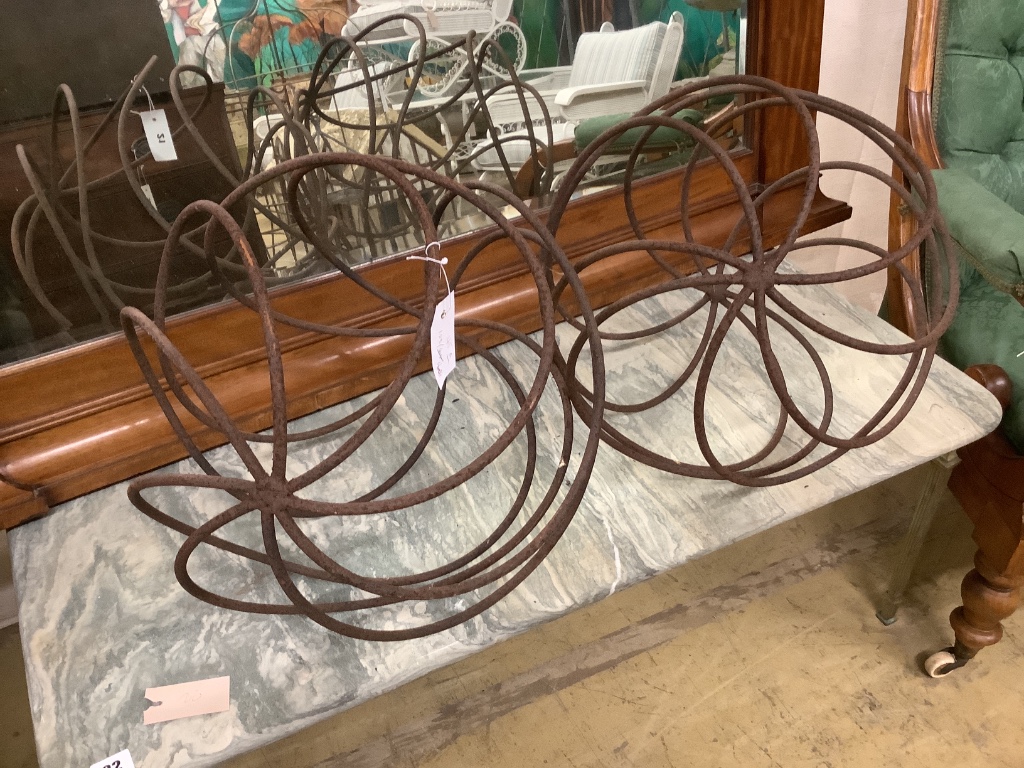 A pair of ball shaped wrought iron growing frames, 40cm diameter